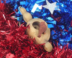 Handmade Wood Birdhouse Ornament Collectable Christmas Tree Ornament shapeed like a Christmas tree. Made from select-grade hardwoods, hand-sanded, and finished with a custom blend of oils and waxes using traditional woodworking tools.