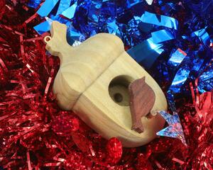 Handmade Wood Birdhouse Ornament Collectable Christmas Tree Ornament shapeed like a Christmas tree. Made from select-grade hardwoods, hand-sanded, and finished with a custom blend of oils and waxes using traditional woodworking tools.