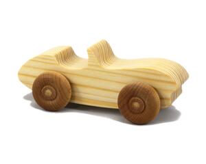 A handcrafted wooden toy convertible sports car, finished with a custom blend of oils and waxes, is the perfect gift for young children.