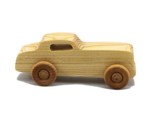 Handmade wooden toy car finished with mineral oil and beeswax, for kids aged three and up.