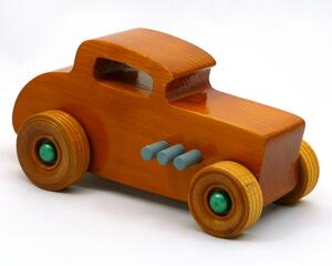 Handmade wooden toy car hot rod 32 deuce coupe with an amber shellac finish and metallic emerald green and gray trim. Perfect for kids or adults.