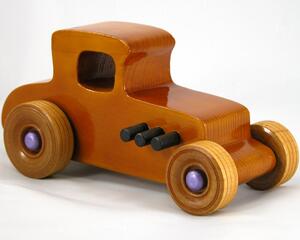 Handmade wooden toy car '27 T-Coupe, finished with amber shellac, metallic purple, and black acrylic paint. Made to order.