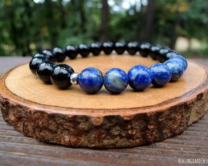 Stress and Negative Energy Protection Bracelet
Black Tourmaline (8mm) and Lapis Lazuli (8mm)

This top selling Rock My Zen combination was created with the intention to help stress and anxiety relief while helping to protect from negative energies. Please let me know in the "Notes to Seller" section if you do not want spacers on your bracelet.

Metaphysical properties of Black Tourmaline are said to help with:
-protection from negative energy including those from psychic attacks.
-grounding
-transmuting negative energy into positive

Metaphysical properties of Lapis Lazuli includes some of the following:
- stress and anxiety relief
- enhancing communication
- has been considered a stone of protection
- increasing self confidence
- considered a calming stone
- said to help with reducing panic attacks