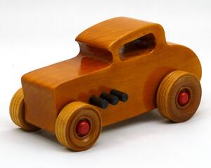 Handmade wooden toy car hot rod 1932 Deuce Coupe amber shellac finish with red and black acrylic paint trim.