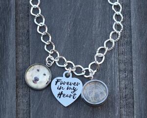 Silver link bracelet with three charms - round Golden Retriever dog photo, Forever in my Heart heart-shaped, and round hair locket. 
