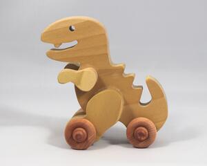 Handmade wooden push toy Tyrannosaurus Rex (T-Rex) dinosaur made from select grade hardwoods and finished with a non-toxic coating.