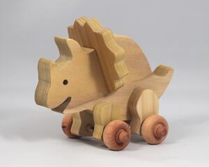 Handmade wooden push toy Triceratops dinosaur made from select grade hardwoods and finished with a non-toxic coating.