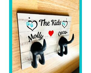 Personalized leash holder for wall with dog butt hooks