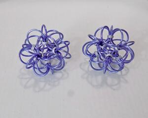 large chainmaille ball fidget toy handmade with anodized aluminum rings in 1 inch lavender and 1/4 inch frost white by RainbowMaille