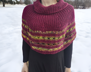 Women's Nursing Access Poncho with turtleneck that covers the shoulders and extends to the waistline. Features magenta yarn on the top turtleneck part and has alternating stripes of magenta and a highlighter yellow multicolor speckled handspun yarn which has pink and green slubs in it, knit into a criscross stitch pattern. One Size Fits All.