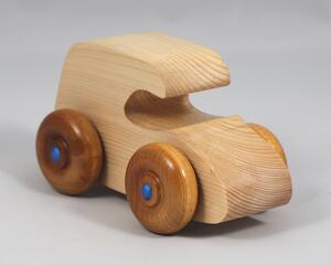 Handmade wooden toy car. The body is finished with clear shellac, and the wheels are finished with amber shellac. The hubs are painted with metallic sapphire blue trim.