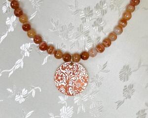 Orange-brown agate beaded necklace with pendant