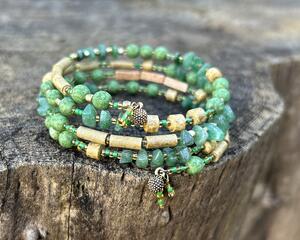 Shades of green, tan and gold memory wire bracelet with 4 strands. Casual and rustic.
