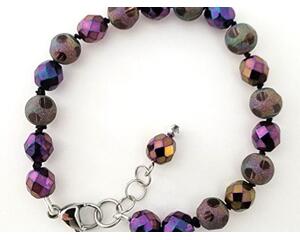 Purple glass beaded bracelet.