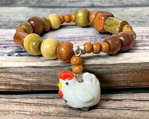 stretchy bracelet with a chicken charm. cute