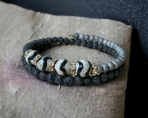 Beautiful zebra bead with gray color beads and lava rock beads.  There are also shiny rhinestones that make the piece stand out.