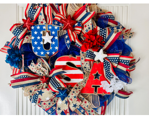 A handmade vintage style flag USA front door wreath 