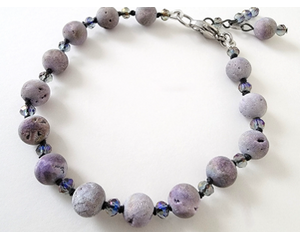 Hand knotted purple matte druzy beaded bracelet with extender chain.