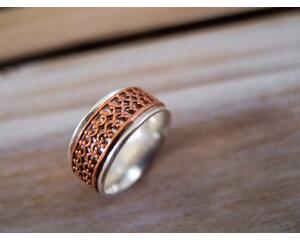Spinner Ring handcrafted from sterling silver and copper double crown wire that spins freely around a lightly hammered sterling silver band.