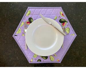 Set of 2 quilted place mats, hexagon shaped, 18 X 16, cotton fabric is pretty lavender purple, dotted and with cheerful avocados