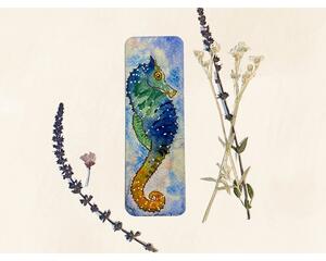 This is an image of a bookmark with a painting of a colorful seahorse. I used blue, orange, yellow, green and white to paint this sea life.