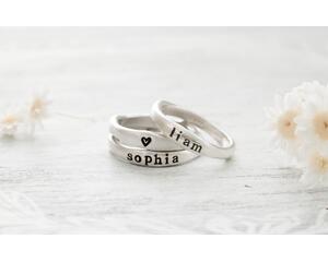 Free formed organic shaped sterling silver ring stamped with name and hearts. 