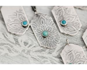 Sterling silver tag necklace with mandala design and a genuine turquoise cabochon. 