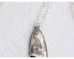Sterling silver and ocean jasper pendant necklace with drusy pocket.