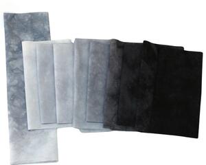 Hand dyed small cuts of gray quilting cotton, suitable for quilting and crafting