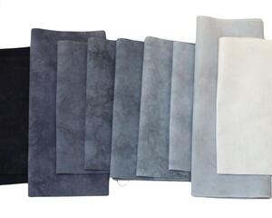 Gray bundle of small cuts of quilting cotton in shades of gray