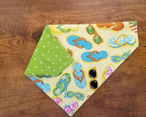 Reversible Over the collar dog bandana with flip flop print and green with white polka dots