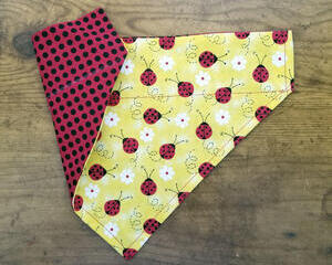Over the Collar Reversible dog bandana lady bugs and black polka dots on red on the other