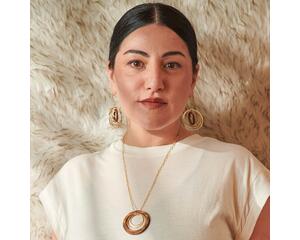 Madera Design Studio's Circles Earrings are a pair of unique, bold, dangle hoop earrings. Handmade in Philadelphia by a small local studio. 