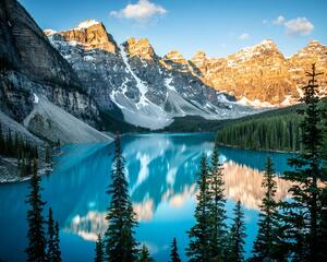 Beautiful Moraine Lake at sunrise, with alpenglow hitting the peaks. Banff National Park, Canada.