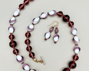 Necklace set | Opalescent lampwork ovals ringed in amethyst swirls, Cherry Brand amethyst glass rounds