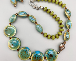 Necklace set | Blue-green ceramic planed ovals and disks, olive jade rondelles, Bali silver style tulip bead