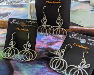 Pumpkin shaped earrings handmade with aluminum wire