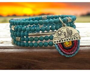 This handmade glass turquoise blue bead bracelet is made on memory wire. With a charm of a cactus.