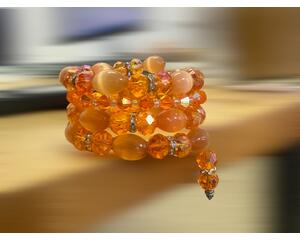 This is a beautiful flashy orange bracelet. I made it on memory wire, which makes it easier than many single bracelets.