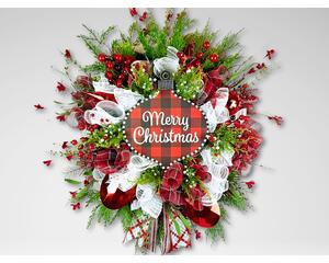 Festive Merry Christmas wreath featuring a plaid ornament centerpiece, vibrant red berries, white mesh ribbons, and lush greenery.