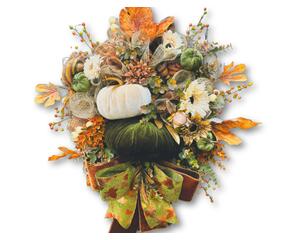 Handcrafted fall wreath with velvet pumpkins, fall leaves, and florals, perfect for adding an elegant autumn touch to your front door.