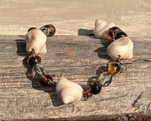 Boho bracelet featuring vintage components and lucite shell beads