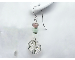 3 rondelle beads in light shades of purple, green, white, with pewter dangles embossed with a star on handcrafted earring wires