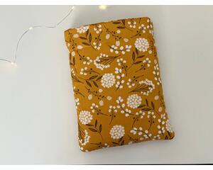 this mustard floral book sleeve has a mustard yellow background with dandelions all over the flower book cover