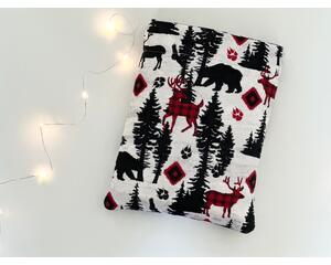 this woodland book sleeve has a light gray background, black trees, plaid and black deer & bears, red & black paw prints