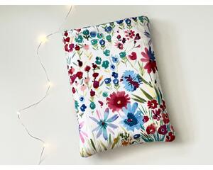 this floral book sleeve has a white background with colorful flowers