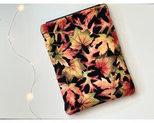 this leaves tablet sleeve has a black background with fall leaves all over the fall tablet pouch