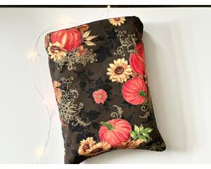 this fall book sleeve has a brown book sleeve there are pumpkins and sunflowers with gold sparkles