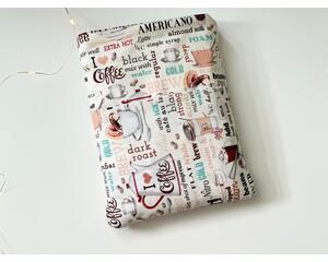 this coffee book sleeve with pocket has a light brown background with coffee cups, some donut, and different names of coffee all over the barista book holder