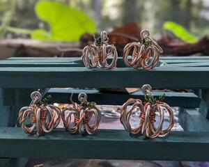 Wire pumpkin earrings handmade in NC by Bendi's Jewelry 
Silver wire wrapped with copper wire and green wire shapes curly vine